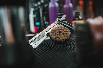 a close up of a hair brush on a table