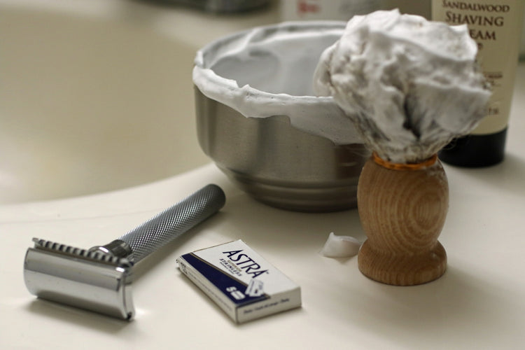 Double edge razor, shaving cream, and brush