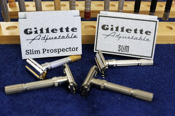 Four gillette adjustable slim razors with their original boxes.
